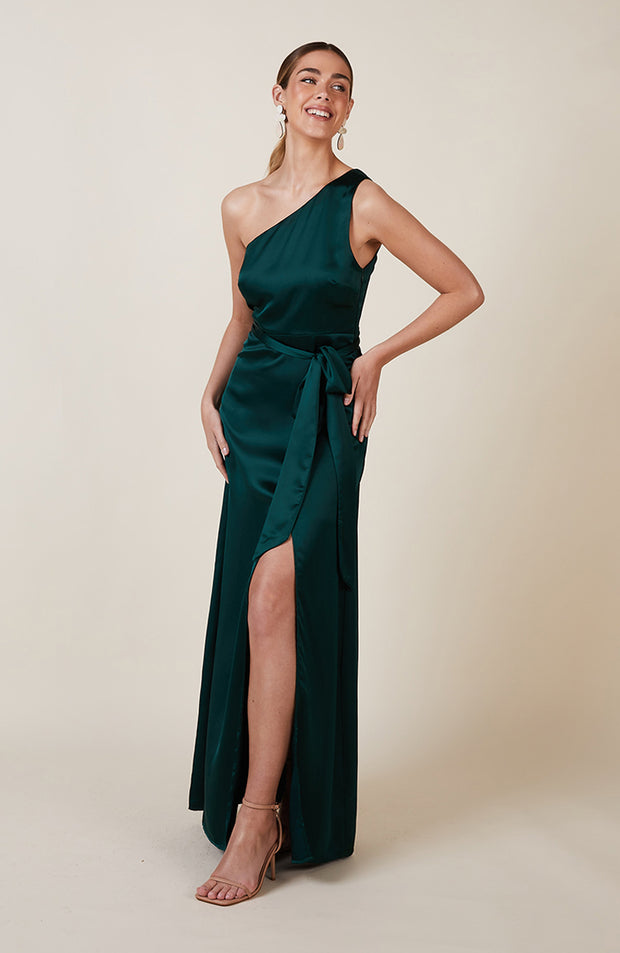 Satin one shoulder bridesmaids dress in forest green with a detachable bow. A beautiful rich forest dark bottle green this dress is a modern and stylish option for all occasions.