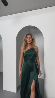 Satin one shoulder bridesmaids dress in forest green with a detachable bow. A beautiful rich forest dark bottle green this dress is a modern and stylish option for all occasions.