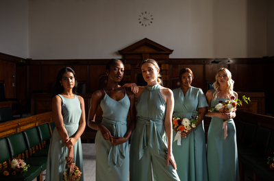 Who traditionally pays for the bridesmaids dresses?