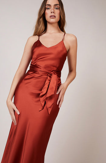 Bias cut satin slip bridesmaids dress in burnt orange. A beautiful rich copper rust colour.