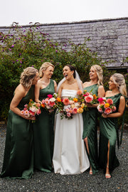Satin one shoulder bridesmaids dress in olive green with a detachable bow. A beautiful rich moss, olive, eucalyptus  this dress is a modern and stylish option for all occasions.