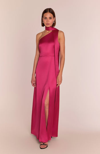 Woman wearing a hot pink satin long gown