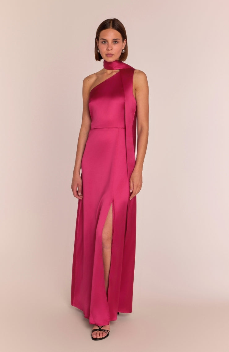 Woman wearing a hot pink satin long gown