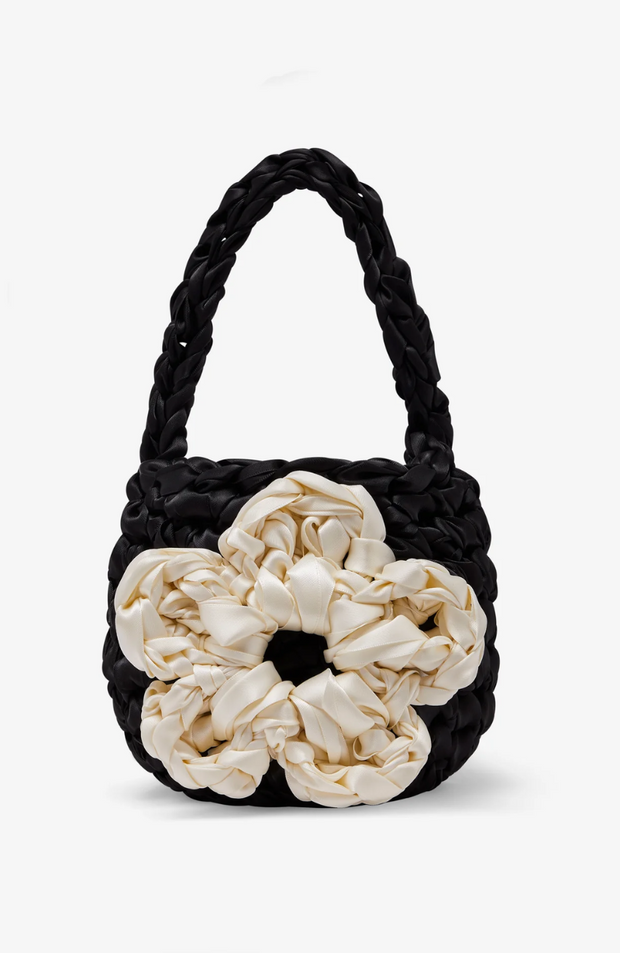 black crochet bag with white flower