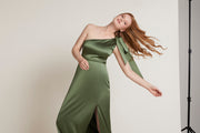 Olive green satin one shoulder dress with a split. Contemporary and modern bridesmaid dress