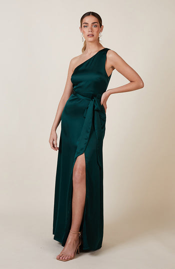 Satin one shoulder bridesmaids dress in forest green with a detachable bow. A beautiful rich forest dark bottle green this dress is a modern and stylish option for all occasions.