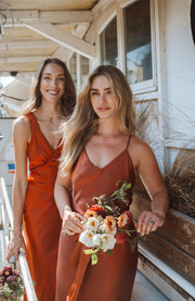 burnt orange and terracotta satin bridesmaids dresses