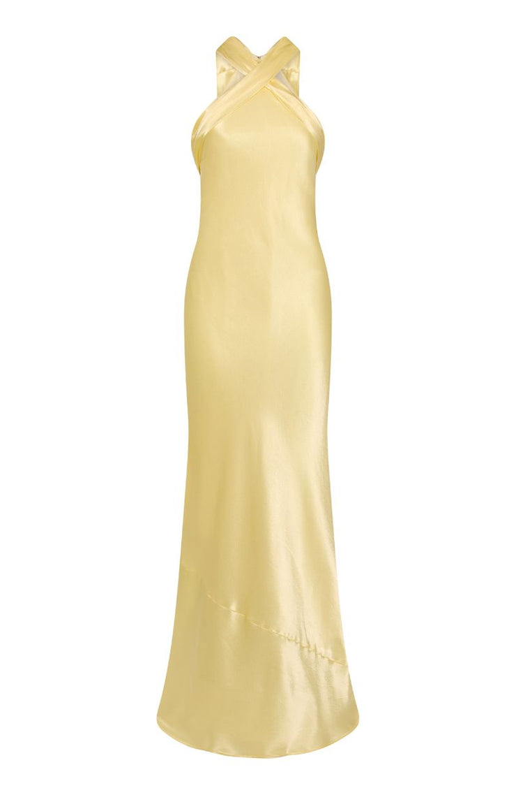 Yellow evening gown with a halter neckline on a white background